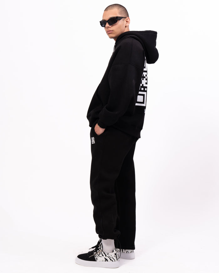 Martin Valen Sigilio black tracksuit set with hoodie, full-length rear view showing QR print on back and small QR on pocket