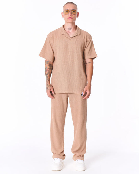 Martin Valen Breeze Fit beige men's tracksuit, front mid-body view showing short-sleeve polo top and ribbed knit texture