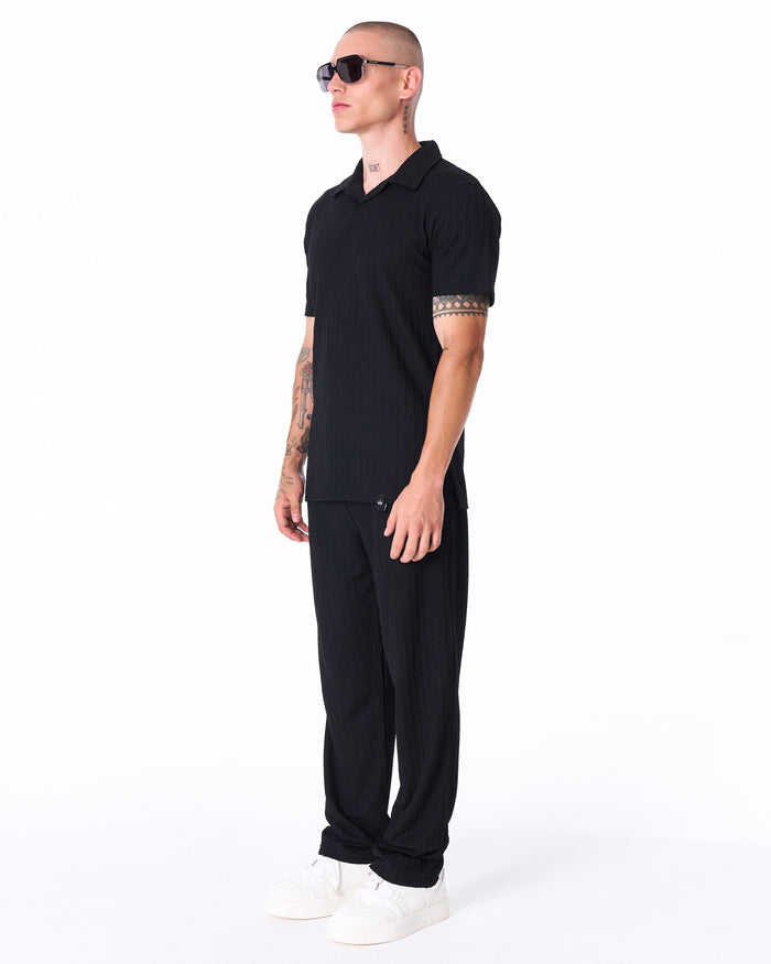 Martin Valen Breeze Fit men's black tracksuit close torso view, ribbed texture visible and side label