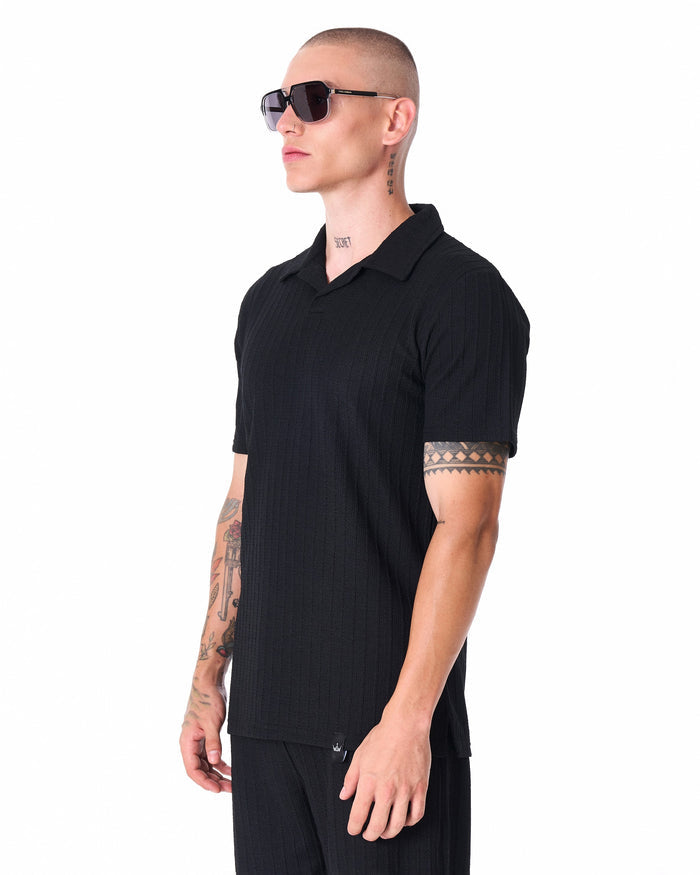 Martin Valen Breeze Fit men's black tracksuit, three-quarter side view showing ribbed polo collar and top