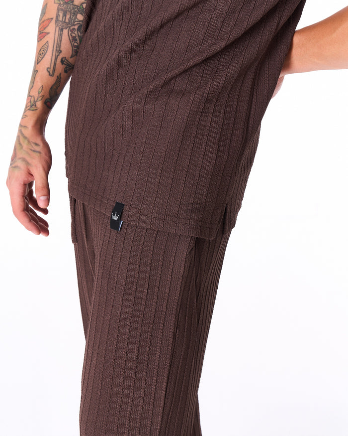 Martin Valen Breeze Fit men's brown tracksuit, side close-up showing ribbed texture and black tag