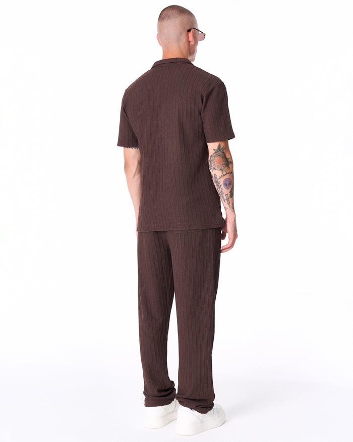 Martin Valen Breeze Fit men's brown tracksuit, vertical view of trousers showing straight cut and ribbed knit