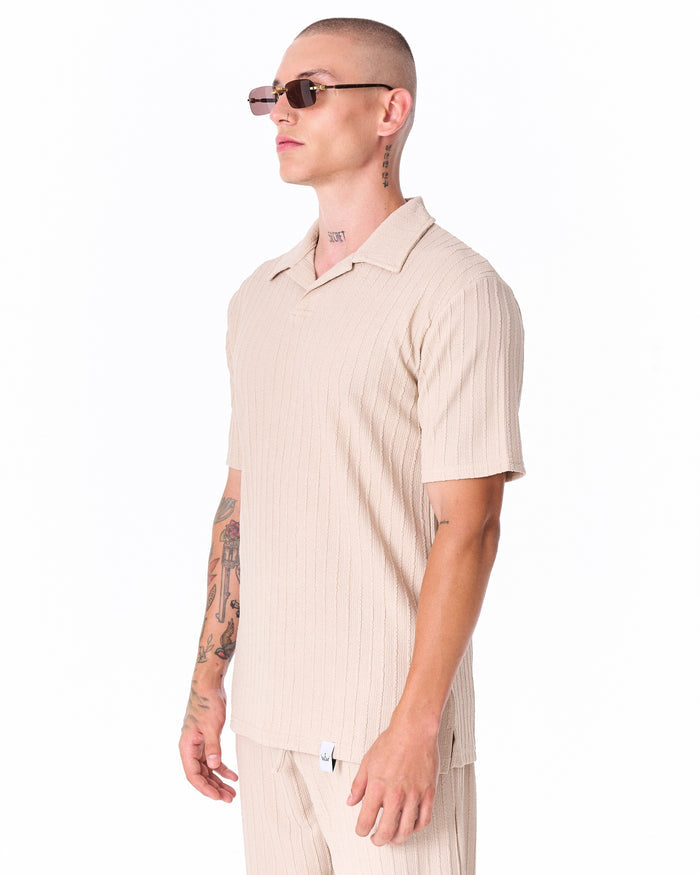 Martin Valen Breeze Fit men's tracksuit in cream, full-length view showing ribbed trousers and white sneakers