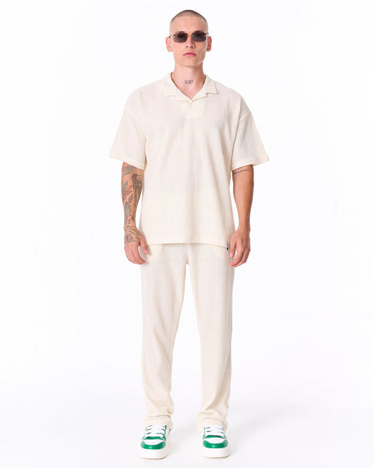 Martin Valen Breeze Fit men's tracksuit in white, full‑length front view showing short‑sleeve polo and textured knit