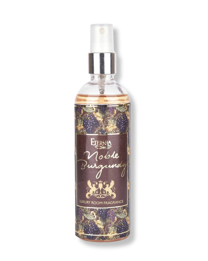 Eternia Noble Burgundy room spray bottle with clear spray nozzle and dark label.