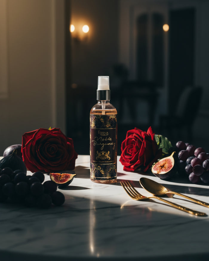 Eternia Noble Burgundy room spray bottle centered with spray nozzle and dark label.