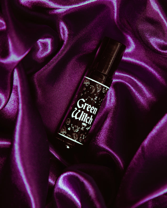 Green Witch roll-on perfume oil with evergreen and amber woodland fragrance