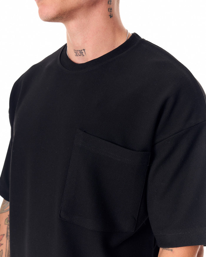 Martin Valen men's full black short tracksuit, close-up front view showing crew neck and chest pocket