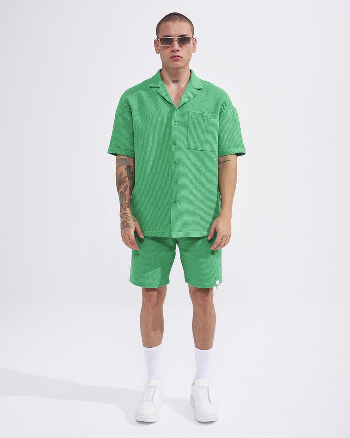 Martin Valen green-teal waffle shorts close-up, side view showing pocket detail and waffle texture