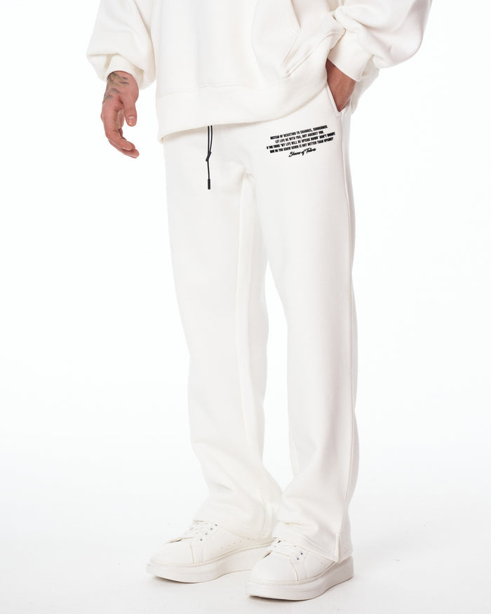 Martin Valen Rumi oversized white hoodie tracksuit, mid shot showing black drawcord and 3D printed text on thigh