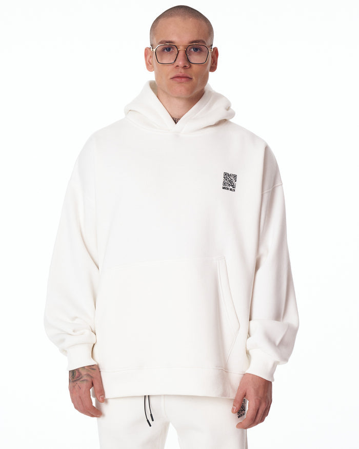 Martin Valen Sigilio oversized white tracksuit set seen from back, hood up and small Martin Valen logo under large QR