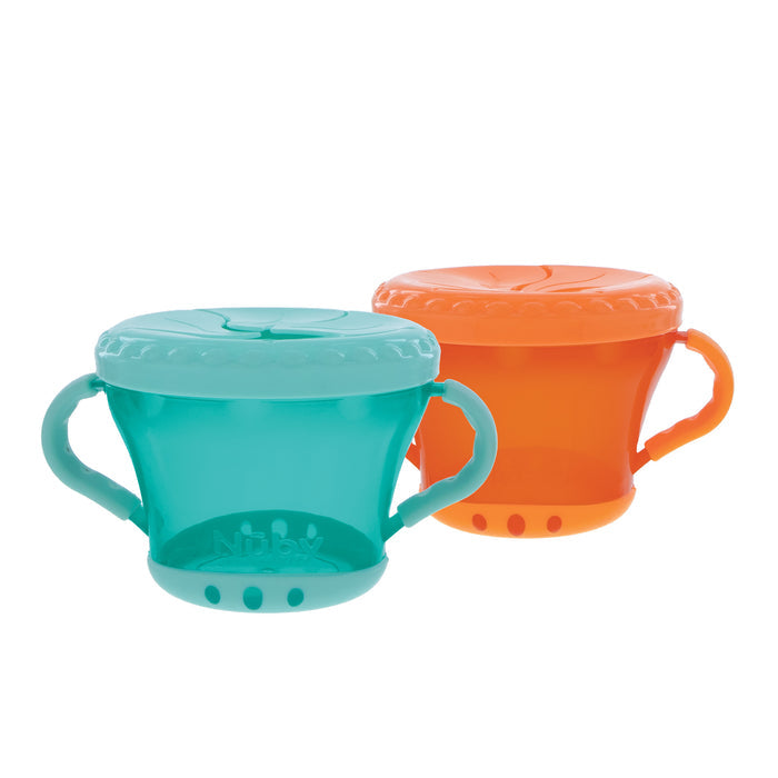 The Snack Keeper Container (2 Pack) includes teal and orange plastic snack cups with handles, designed for kids. Each cup has a flexible, spill-resistant lid with slits to help prevent messes.