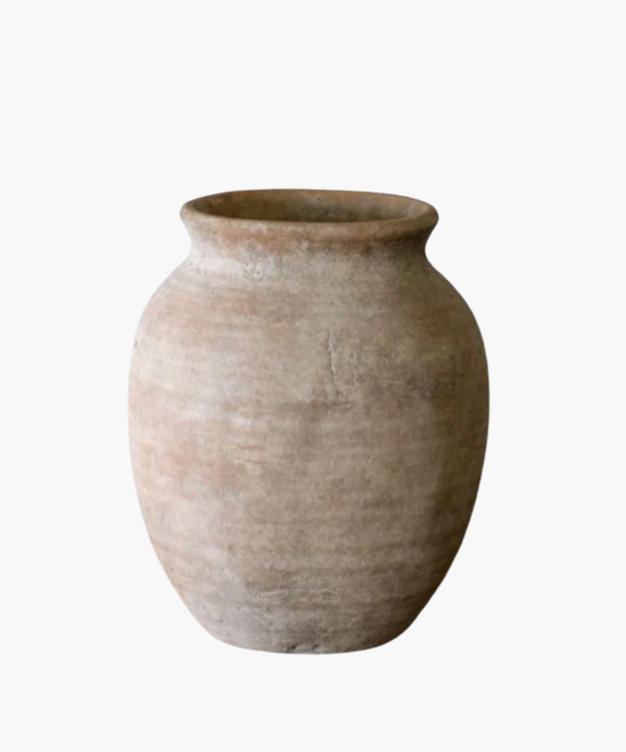 Aged clay pot with a wide body and narrow top, featuring a rough, textured surface in earthy brown tones. The pot conveys a rustic, antique feel. | Wildwood Home Co.