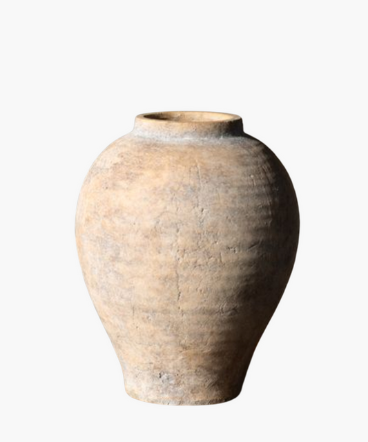 Antique clay vase with an earthy texture and rounded shape, showing signs of aging. The surface has a rustic, weathered appearance. | Wildwood Home Co.