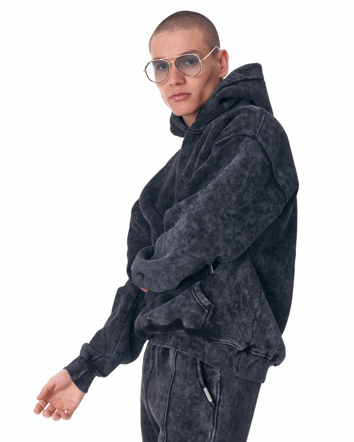 Martin Valen Urban Style washed anthracite tracksuit, low-angle view showing matching joggers and white sneakers
