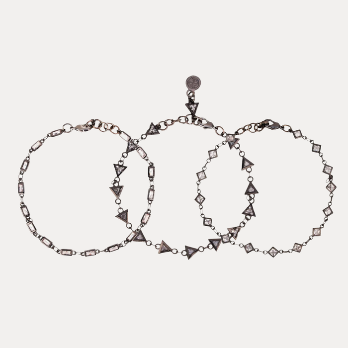 a group of bracelets with diamonds