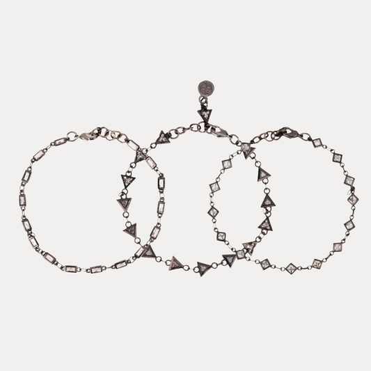 a group of bracelets with diamonds