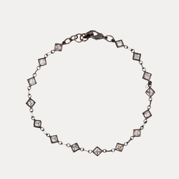 a bracelet with diamonds on it