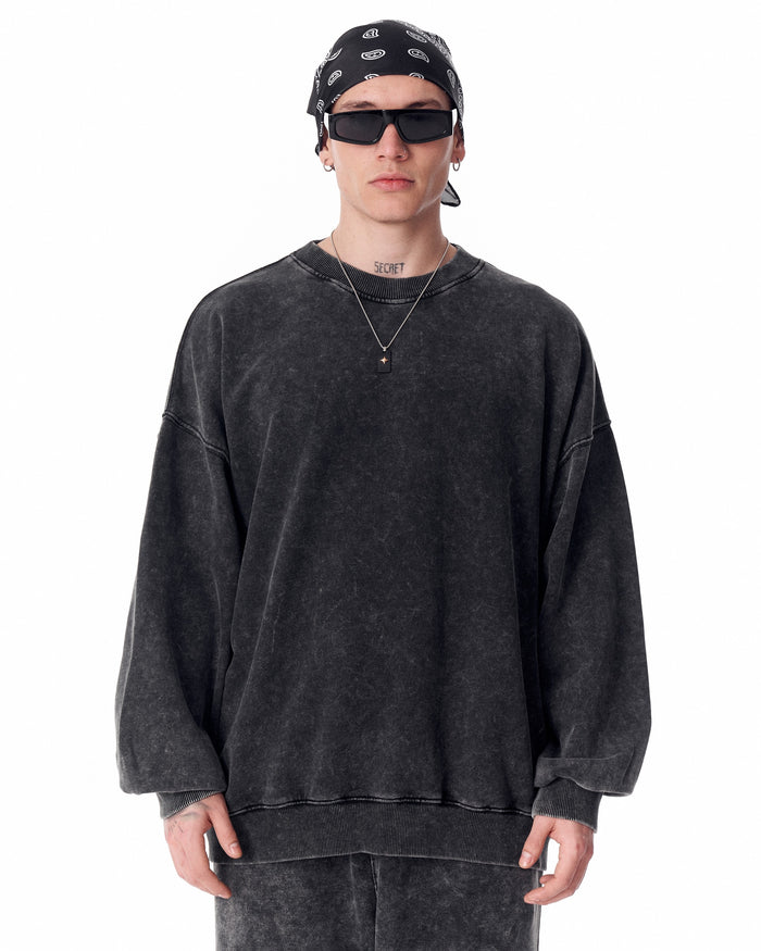 Martin Valen washed gray oversized tracksuit for men, three-quarter view with one hand in side pocket
