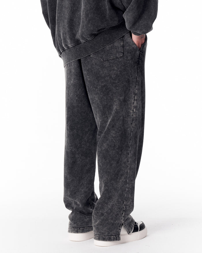 Martin Valen washed gray oversized tracksuit for men, side view of pants showing back pocket and ribbed waistband